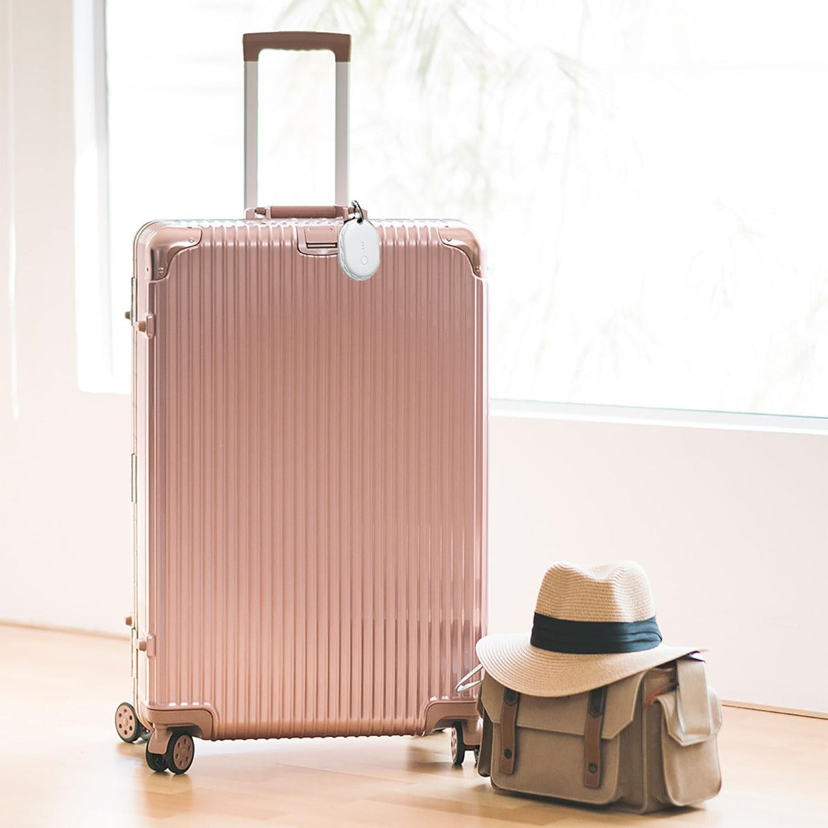 Laser - Mini travel smart tag in White 1pk - Wholesales Supply